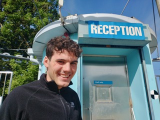 Boyd in front of the entrance booth at the lido